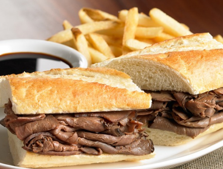French dip sandwich with au jus and fries