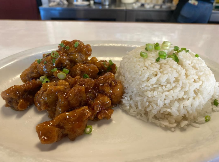 Orange chicken over steamed rice