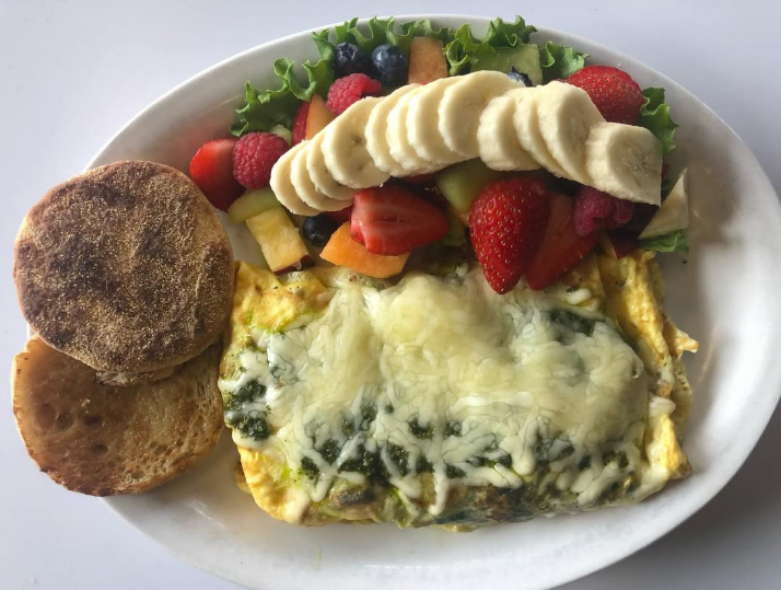 Spinach and cheese omelet with English muffin and fresh fruit